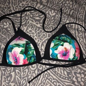 Target flower and black bathing suit top.